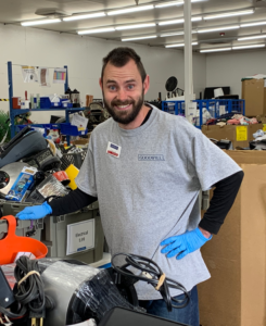 Male Goodwill employee in the Goodwill production area.