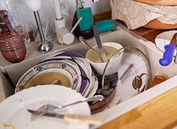 Sink full of dirty dishes